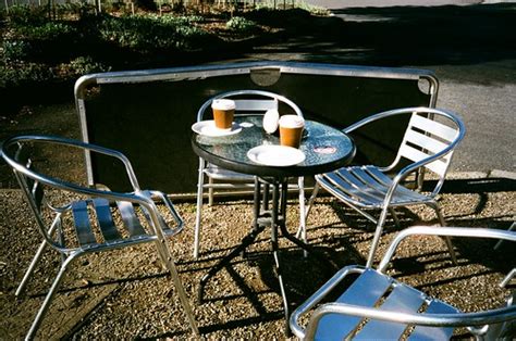 Table, chairs and disposable coffee cups | Photographed usin… | Flickr