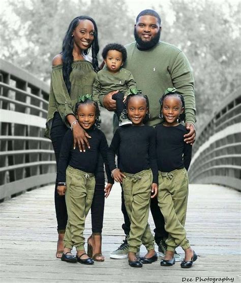 Black family photo in matching outfits on Stylevore