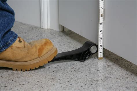 Foot-activated DoorJack™ Makes It Simple for One Person to Quickly and Easily Hang Almost Any ...