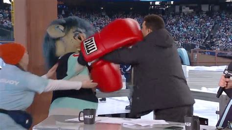 NHL analyst Paul Bissonnette fights with Seattle Kraken mascot in ...