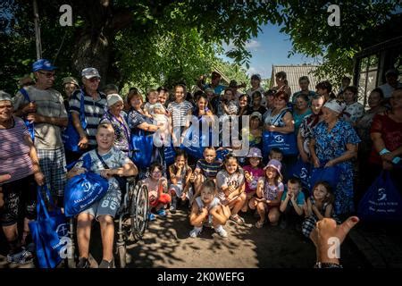 Slovyansk, Donetsk Oblast, Ukraine. 27th July, 2022. Residents receive ...