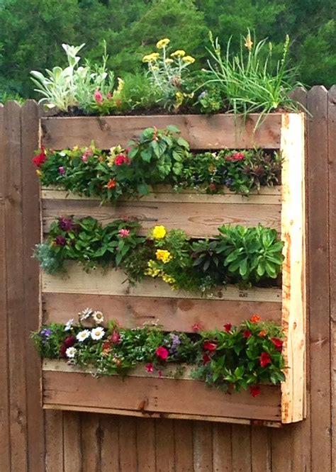 Vertical Pallet Flower Box Garden. Added landscape fabric then thick plastic, then plywood to ...