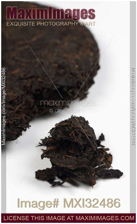 Photo of Pu-er Pu-erh fermented Chinese black tea Bingcha closeup ...