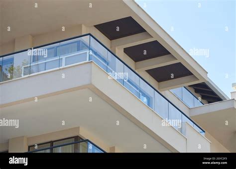 Balcony with glass railing in a modern house Stock Photo - Alamy