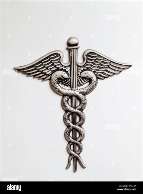 CADUCEUS AN INSIGNIA OF HERMES WINGED STAFF TWINED WITH SERPENTS NOW THE SYMBOL OF THE MEDICAL ...