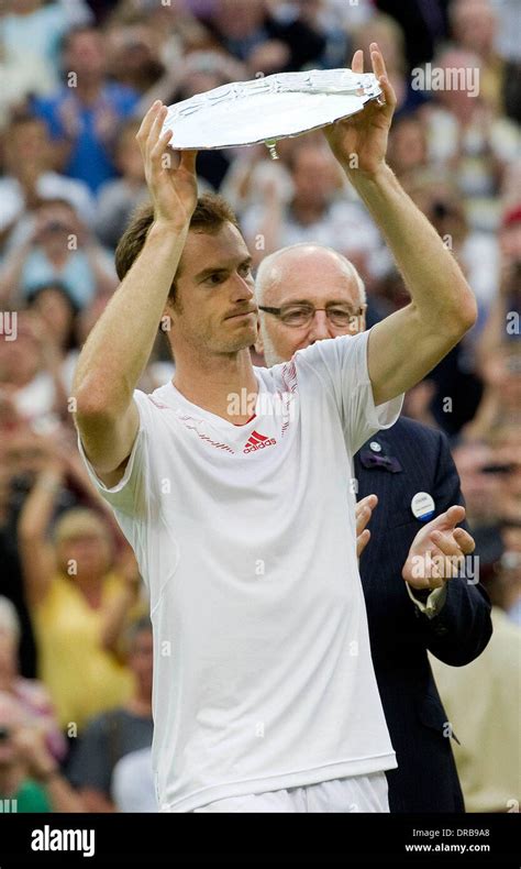 Andy Murray with his runner- up trophy after the Wimbledon men's final ...