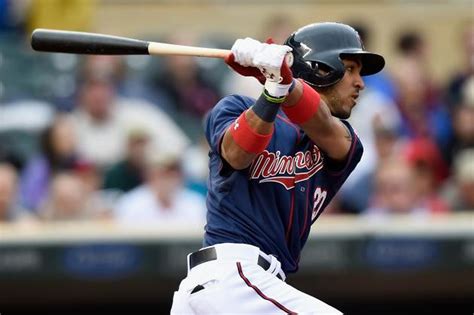 Watch Twins' Eddie Rosario homer on first major league pitch and family ...