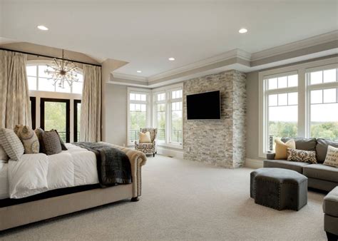 large bedroom with stone wall - Homedit