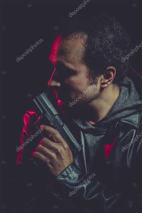 Man with a gun — Stock Photo © outsiderzone #53934159