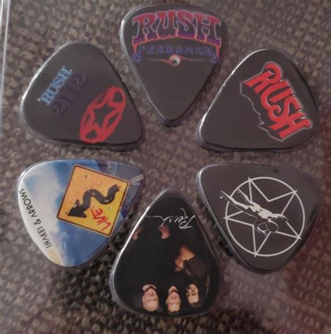 Set of Rush guitar picks I got for Christmas 😃 : r/rush