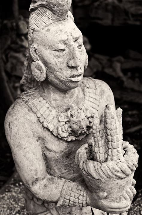 Image post: Statue of an ancient Mayan presenting a gift of corn. Photographed in the Riviera ...