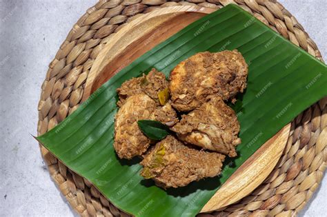 Premium Photo | Rendang ayam or chicken rendang is a traditional dry ...