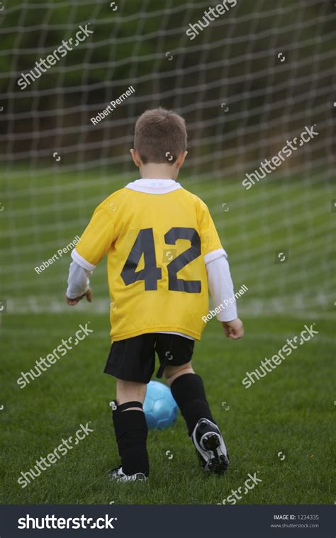 Young Child Scoring Soccer Goal Stock Photo 1234335 - Shutterstock