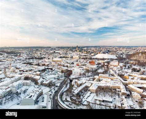 Beautiful Vilnius city panorama in winter with snow covered houses ...