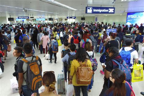 BI hires 300 new officers, e-gates seen to shorten immigration queues - The Filipino Times