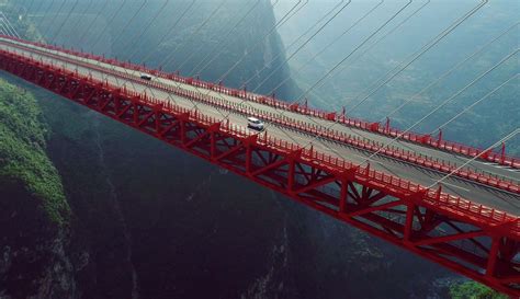 World's highest bridge: majestic beipanjiang bridge stands 565 meters above a river valley in ...