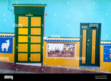 Colorful decorated houses in Guatape village, Colombia Stock Photo - Alamy