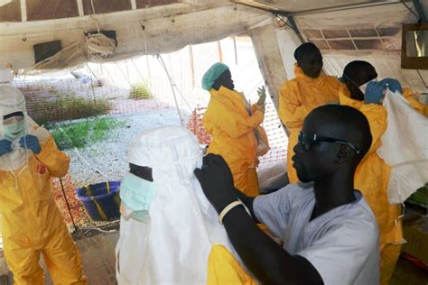 As Ebola virus spreads in West Africa, some blame health workers - Los ...