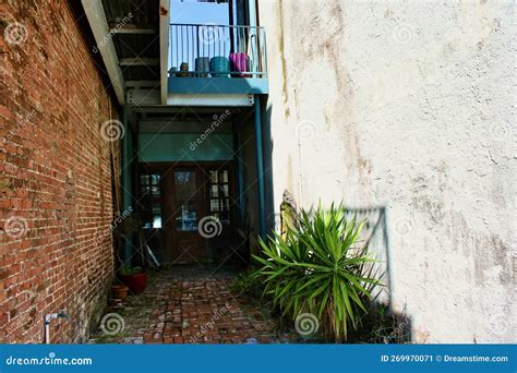 Small Alleyway Contrasting Old Brick To Parged Concrete Wall Apalachicola Florida Stock Image ...