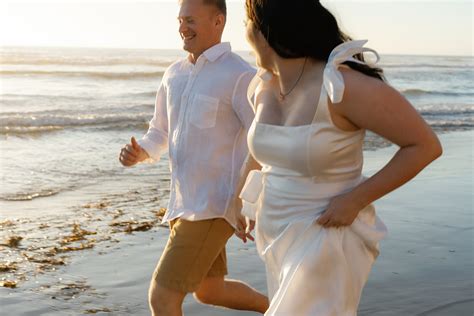 Del Mar Dog Beach Engagement Photos in San Diego