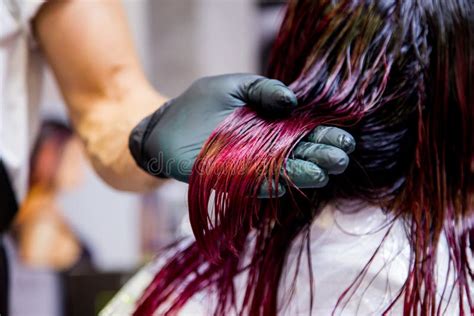 Professional Hairdresser Dyeing Hair. Multicolor with Stretching Coloring. Fluorescent Staining ...