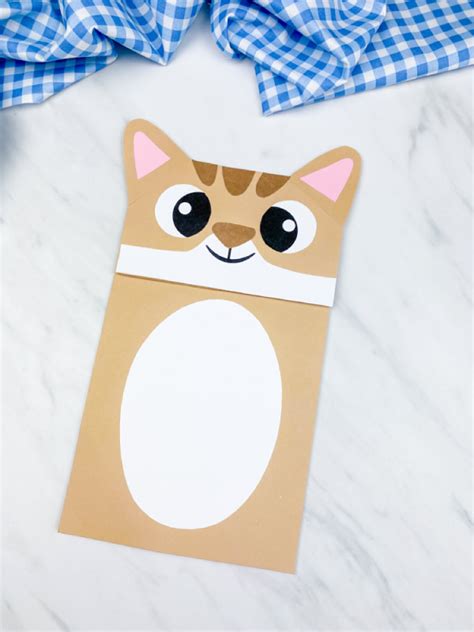 Looking for an easy and cute pet craft for kids to make? This brown paper bag cat puppet is ...