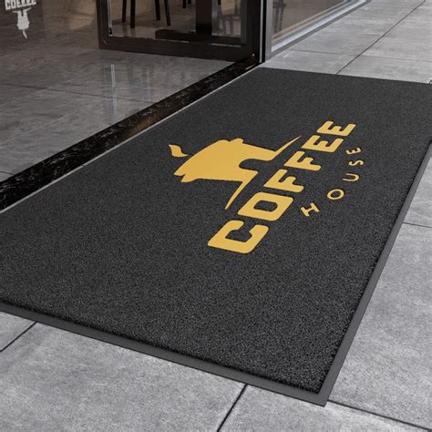 an entrance mat with the words coffee on it