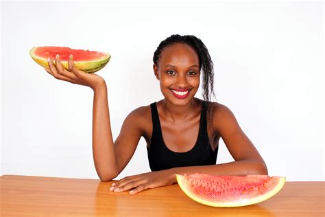 Healthy Woman Holding Juicy Sliced Watermelon