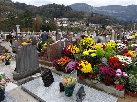 On All Saints Day French cemeteries are a colourful sight when people ...