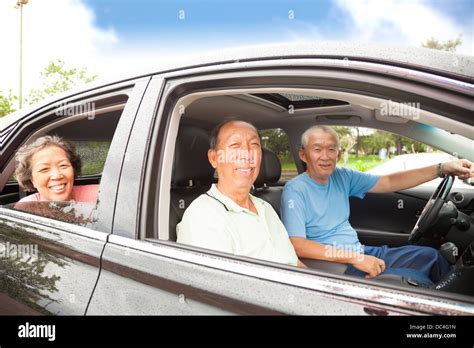 happy seniors enjoying road trip and travel Stock Photo - Alamy