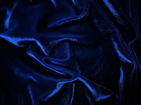 Blue velvet fabric texture used as background. Empty blue fabric background of soft and smooth ...