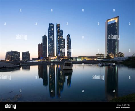 Night skyline view of Etihad Towers in Abu Dhabi in United Arab Emirates Stock Photo - Alamy