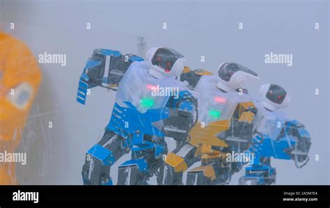 Humanoid robots dancing at robotic show Stock Photo - Alamy