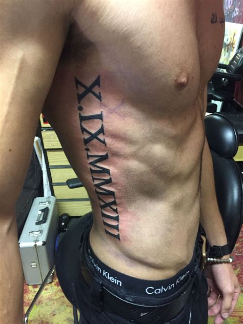 Roman Numeral Tattoo Ribs | Rib tattoos for guys, Rib tattoo, Tattoos ...