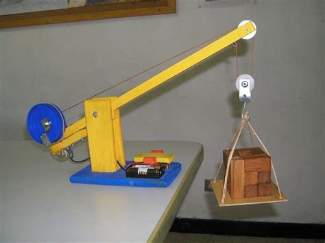 DIY Toy Wooden Crane with electric motor and forward/reverse switch | Wooden toy boxes, Wood diy ...