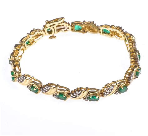 14 CT GOLD EMERALD & DIAMOND BRACELET