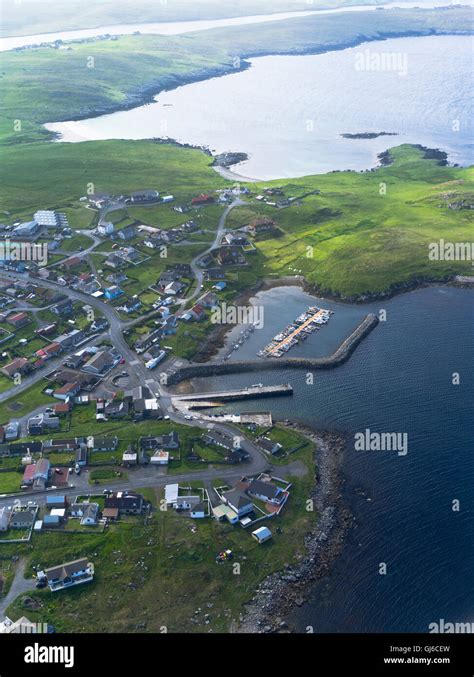 dh HAMNAVOE SHETLAND Aerial view of Hamna Voe pier marina Shetland ...