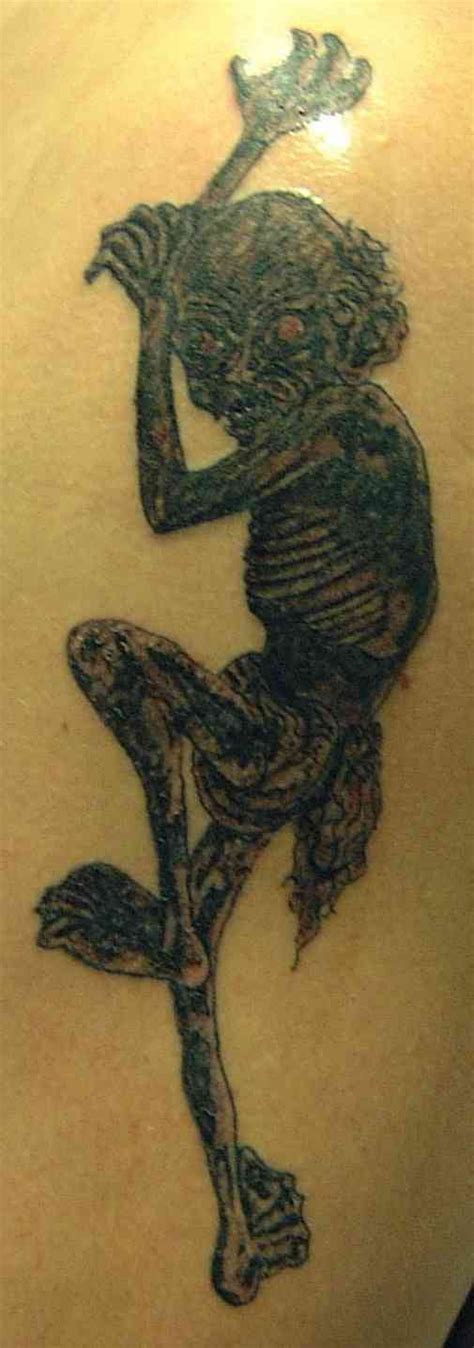 Ugly zombie demon tattoo - Tattooimages.biz