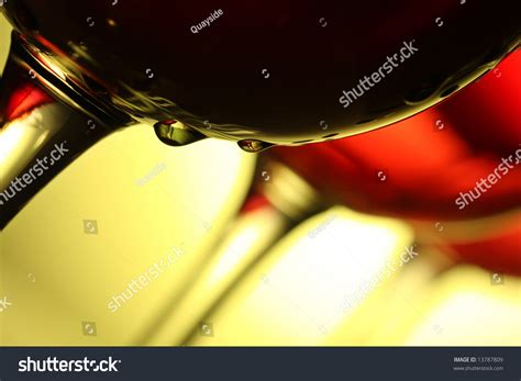 Three Beautiful Red Wine Glasses, With A Drip Of Wine Running Down The Glass Stock Photo ...