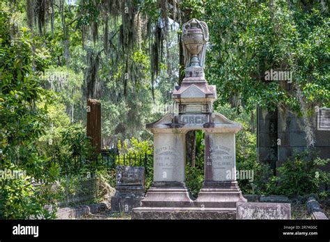 Historic Bonaventure Cemetery memorial amidst Southern live oaks and Spanish moss in Savannah ...