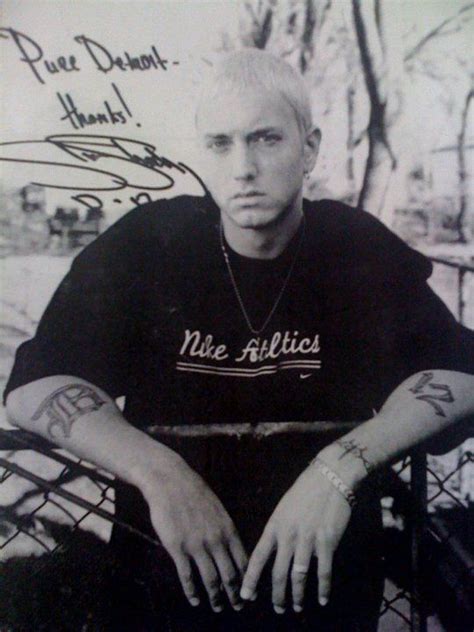 Eminem autograph. PURE DETROIT Mr Slim, Loki Poster, Beauty And The Beat, Rap God, Bad Memories ...