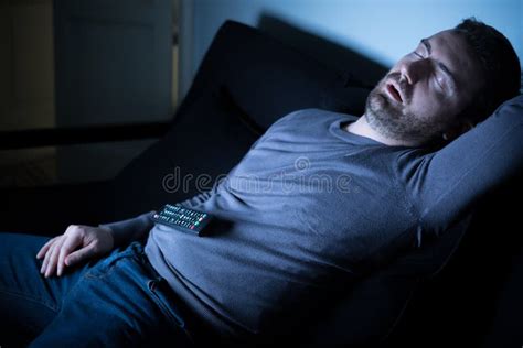 Bored Man Sleeping and Watching Tv at Night Stock Image - Image of ...