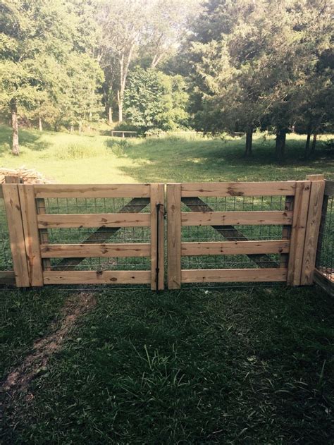 Fence gate by Yard Dog Fence of Nashville | Dog yard fence, Fenced vegetable garden, Backyard fences