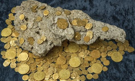 Florida treasure hunters find $4.5m in rare Spanish coins | Gold coins ...