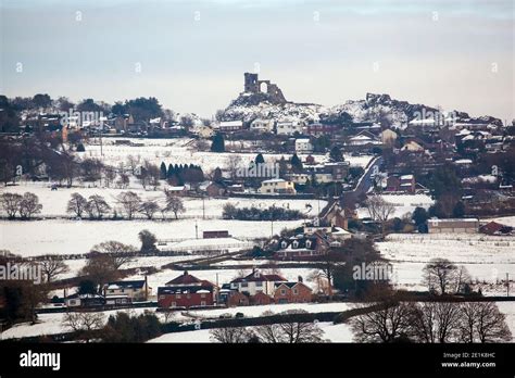 Mow Cop castle, the folly of a ruined castle in snow during winter ...