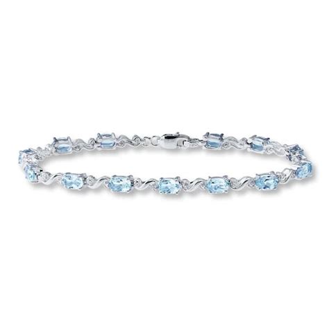 Oval aquamarines and diamond-accented sterling silver links give this 7 ...