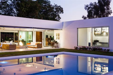 L-Shaped Family Home Charms with a Stunning Private Courtyard and Pool ...