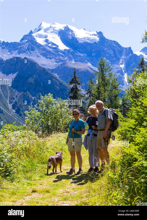 Hiking in Alps Stock Photo - Alamy