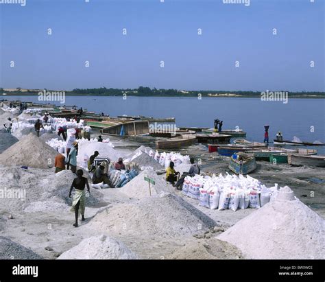 worker mining Pink lake Retba lake sea saltworks salt salt production ...