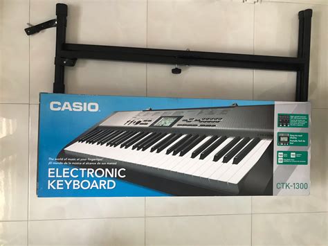 Casio electronic Keyboard + stand, Music & Media, Music Instruments on Carousell